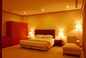 Imagen general del Hotel Grand Inn Xijiao Apartment Hotel. Foto 11