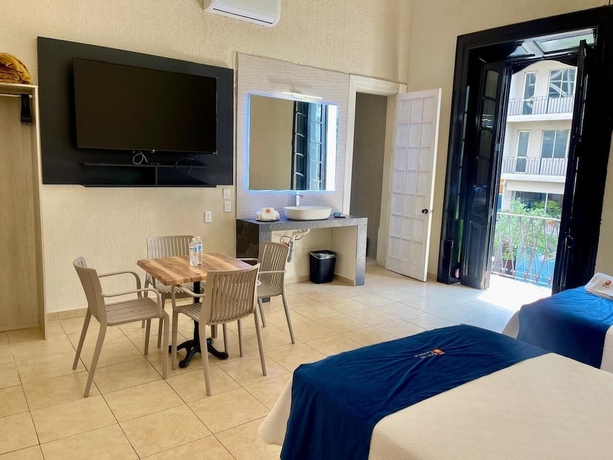Imagen de la habitación del Hotel Grand Isitia. Foto 8