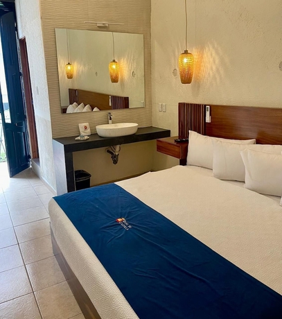 Imagen de la habitación del Hotel Grand Isitia. Foto 11
