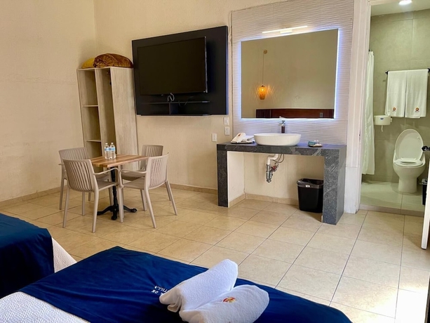 Imagen de la habitación del Hotel Grand Isitia. Foto 13