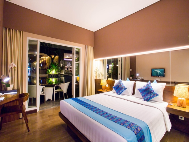 Imagen de la habitación del Hotel Grand Ixora Kuta Resort. Foto 6