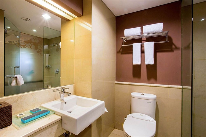 Imagen de la habitación del Hotel Grand Ixora Kuta Resort. Foto 7