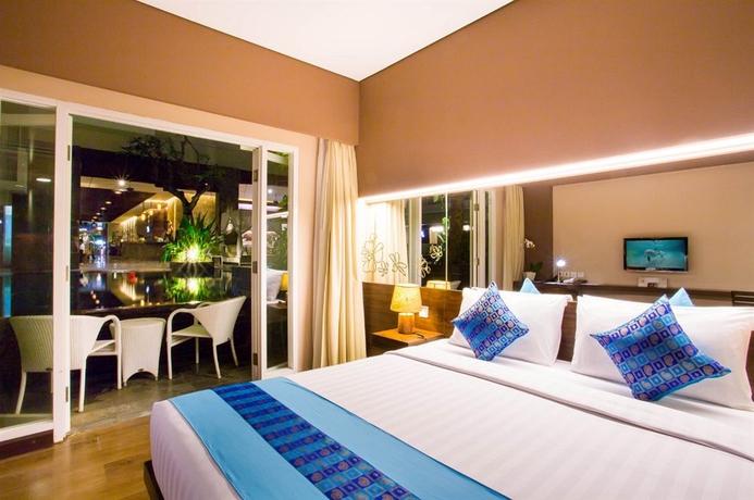 Imagen de la habitación del Hotel Grand Ixora Kuta Resort. Foto 8