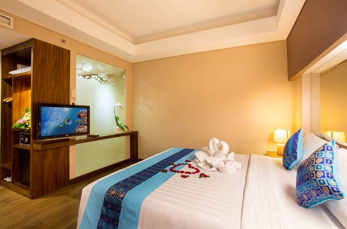 Imagen de la habitación del Hotel Grand Ixora Kuta Resort. Foto 10