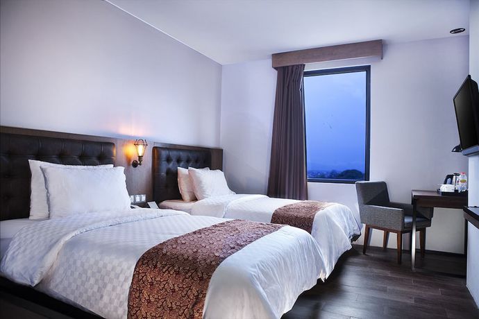 Imagen de la habitación del Hotel Grand Kangen Urip Sumoharjo Yogyakarta. Foto 4
