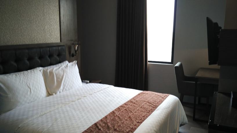 Imagen de la habitación del Hotel Grand Kangen Urip Sumoharjo Yogyakarta. Foto 6