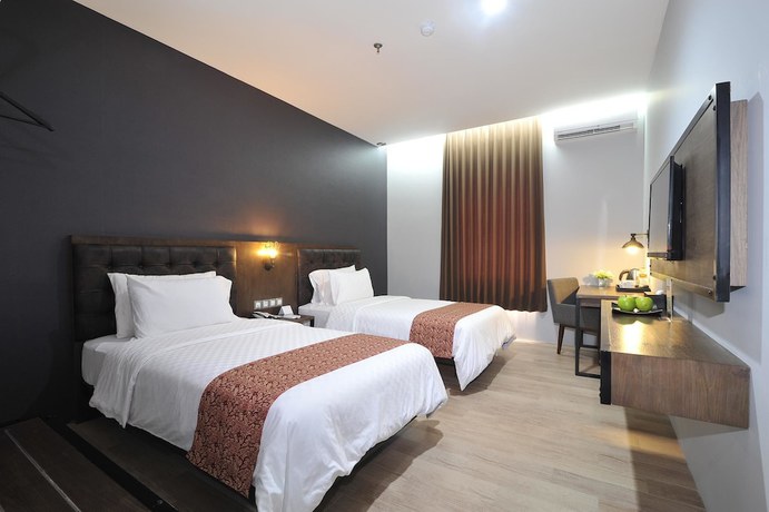 Imagen de la habitación del Hotel Grand Kangen Urip Sumoharjo Yogyakarta. Foto 10