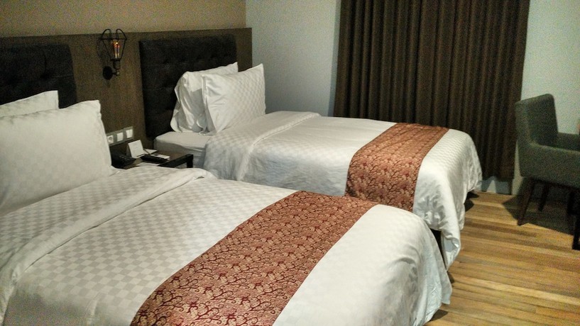 Imagen de la habitación del Hotel Grand Kangen Urip Sumoharjo Yogyakarta. Foto 12