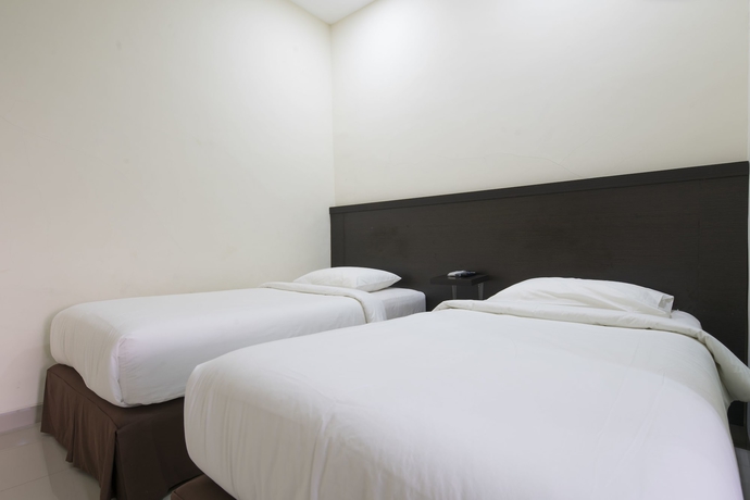 Imagen de la habitación del Hotel Grand Kebonsari. Foto 6