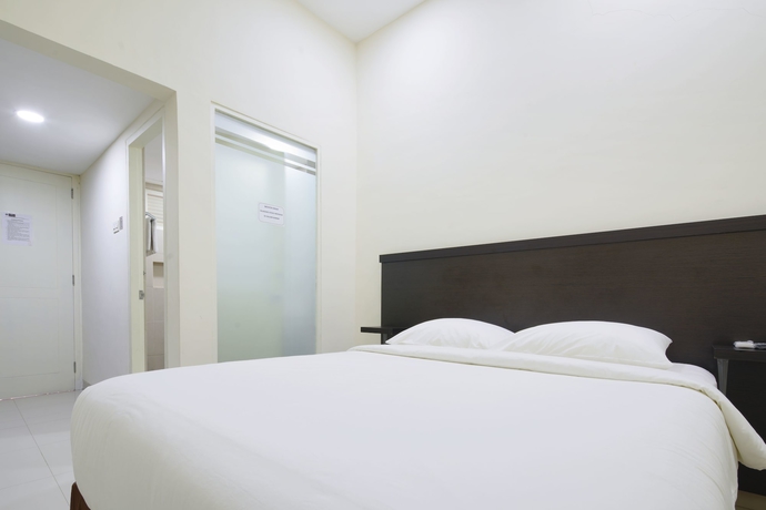 Imagen de la habitación del Hotel Grand Kebonsari. Foto 7