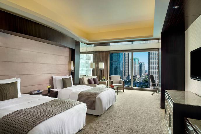 Imagen de la habitación del Hotel Grand Kempinski Shanghai. Foto 16
