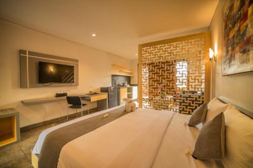 Imagen de la habitación del Hotel Grand Kesambi Resort and Villas. Foto 7