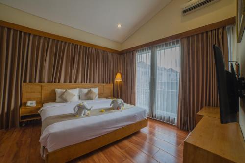 Imagen de la habitación del Hotel Grand Kesambi Resort and Villas. Foto 9
