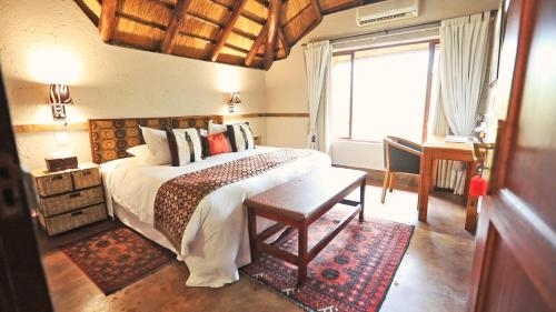 Imagen de la habitación del Hotel Grand Kruger Lodge And Spa. Foto 8