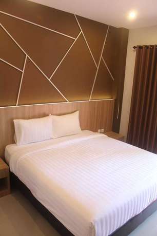Imagen de la habitación del Hotel Grand Kuta. Foto 8