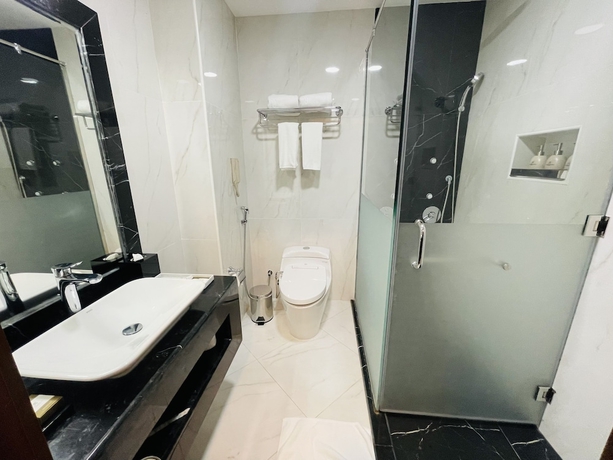 Imagen de la habitación del Hotel Grand Legacy Doha. Foto 16