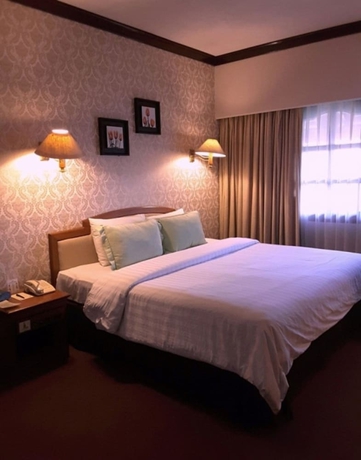 Imagen de la habitación del Hotel Grand Legi Mataram. Foto 4