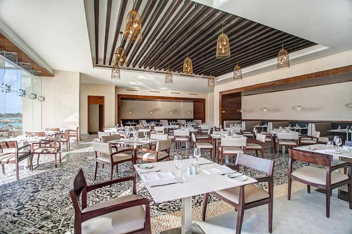 Imagen del bar/restaurante del Hotel Grand Lido Negril Au-naturel, An Autograph Collection All-inclusive Resort - Adults Only. Foto 4