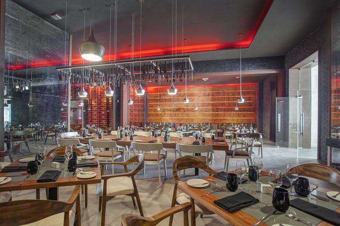 Imagen del bar/restaurante del Hotel Grand Lido Negril Au-naturel, An Autograph Collection All-inclusive Resort - Adults Only. Foto 6