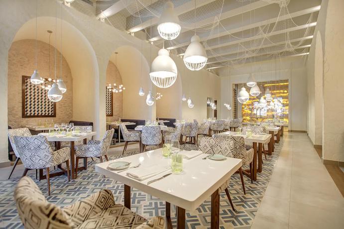 Imagen del bar/restaurante del Hotel Grand Lido Negril Au-naturel, An Autograph Collection All-inclusive Resort - Adults Only. Foto 17