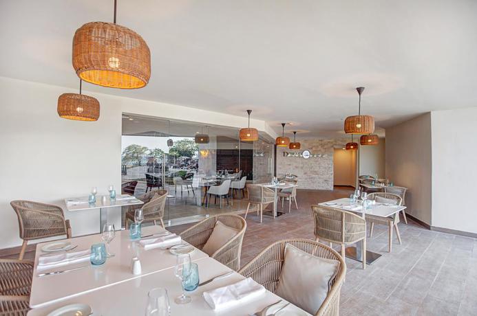 Imagen del bar/restaurante del Hotel Grand Lido Negril Au-naturel, An Autograph Collection All-inclusive Resort - Adults Only. Foto 20