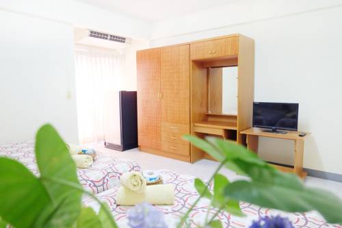 Imagen de la habitación del Hotel Grand Living Place. Foto 14