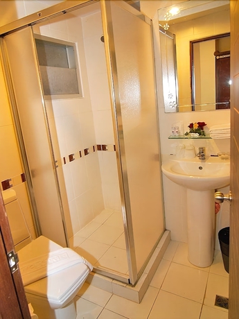 Imagen de la habitación del Hotel Grand Lucky. Foto 8