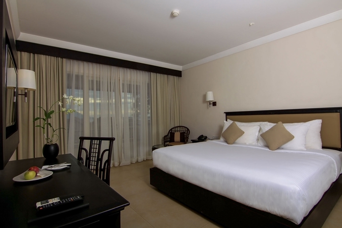 Imagen de la habitación del Hotel Grand Luley Manado. Foto 8