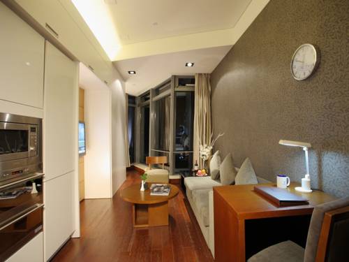 Imagen de la habitación del Hotel Grand Madison Qingdao Harbour View Central. Foto 4
