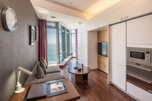 Imagen de la habitación del Hotel Grand Madison Qingdao Harbour View Central. Foto 6