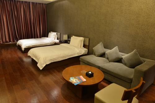 Imagen de la habitación del Hotel Grand Madison Qingdao Harbour View Central. Foto 7