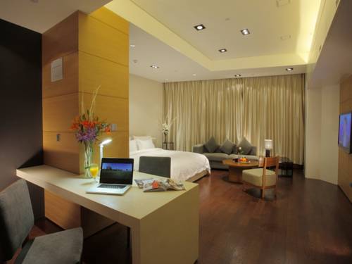 Imagen de la habitación del Hotel Grand Madison Qingdao Harbour View Central. Foto 8