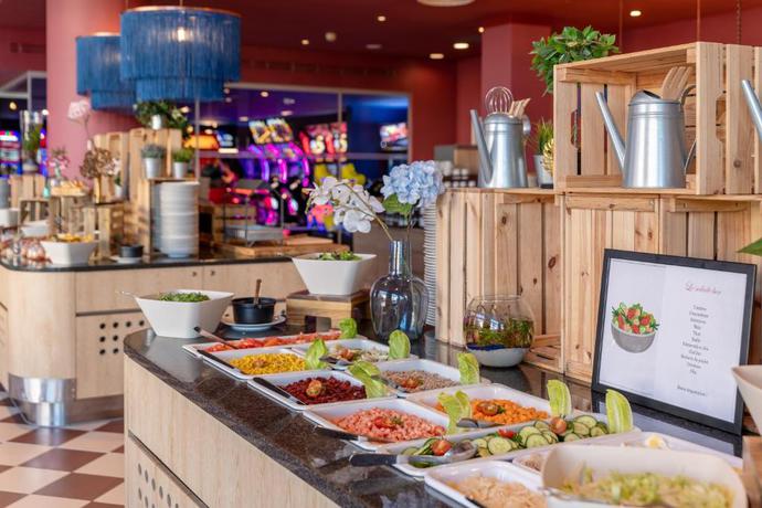 Imagen del bar/restaurante del Hotel Grand Magic Hotel Marne La Vall&eacute;e. Foto 2