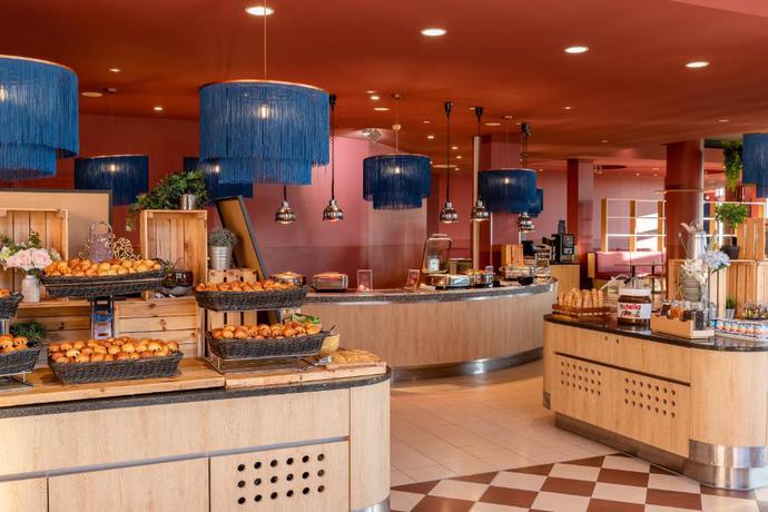 Imagen del bar/restaurante del Hotel Grand Magic Hotel Marne La Vall&eacute;e. Foto 3