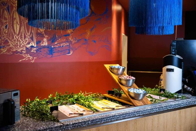 Imagen del bar/restaurante del Hotel Grand Magic Hotel Marne La Vall&eacute;e. Foto 5