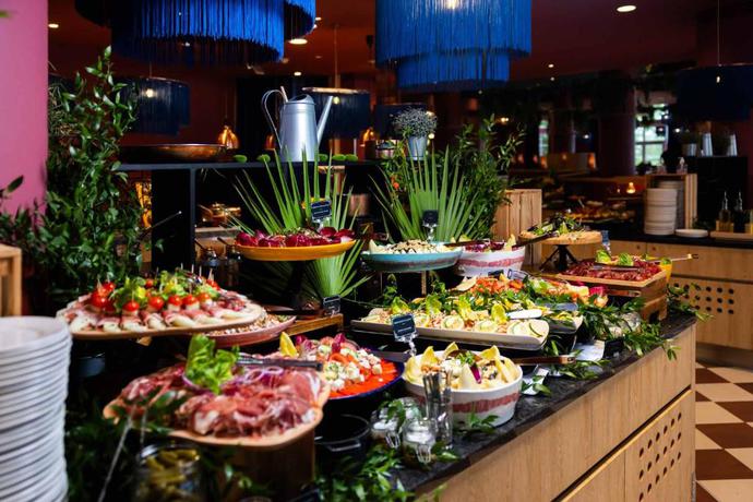 Imagen del bar/restaurante del Hotel Grand Magic Hotel Marne La Vall&eacute;e. Foto 6