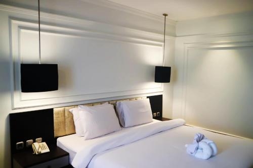 Imagen de la habitación del Hotel Grand Mahkota Pontianak. Foto 8