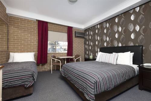 Imagen de la habitación del Hotel Grand Manor Motor Inn - Queanbeyan. Foto 2