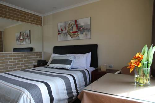 Imagen de la habitación del Hotel Grand Manor Motor Inn - Queanbeyan. Foto 4