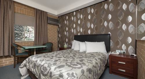 Imagen de la habitación del Hotel Grand Manor Motor Inn - Queanbeyan. Foto 5