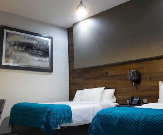 Imagen de la habitación del Hotel Grand Marques. Foto 17