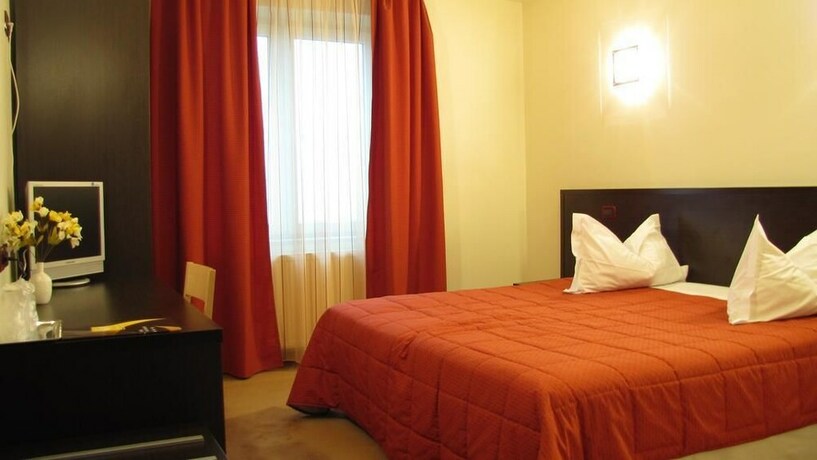Imagen de la habitación del Hotel Grand Master. Foto 7