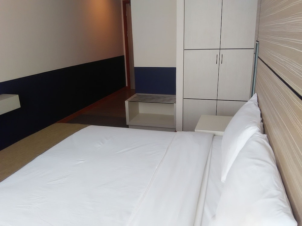 Imagen de la habitación del Hotel Grand Medallion. Foto 3