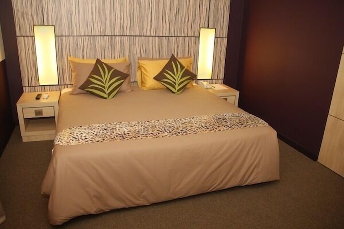 Imagen de la habitación del Hotel Grand Medallion. Foto 4