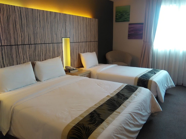 Imagen de la habitación del Hotel Grand Medallion. Foto 9