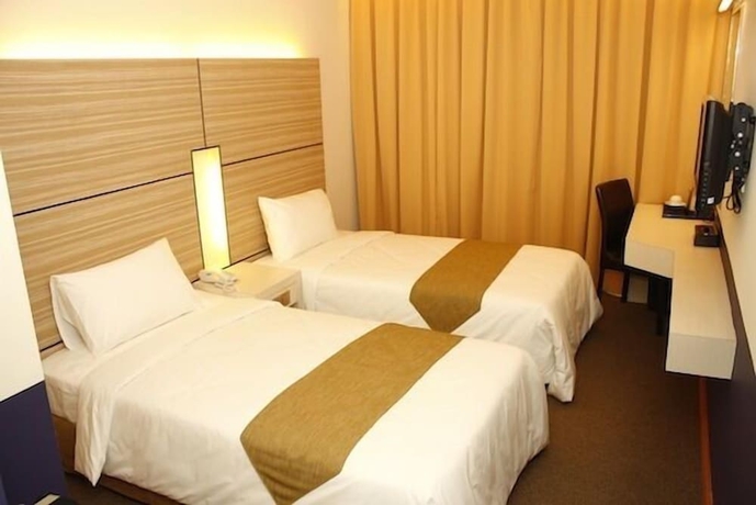 Imagen de la habitación del Hotel Grand Medallion. Foto 11