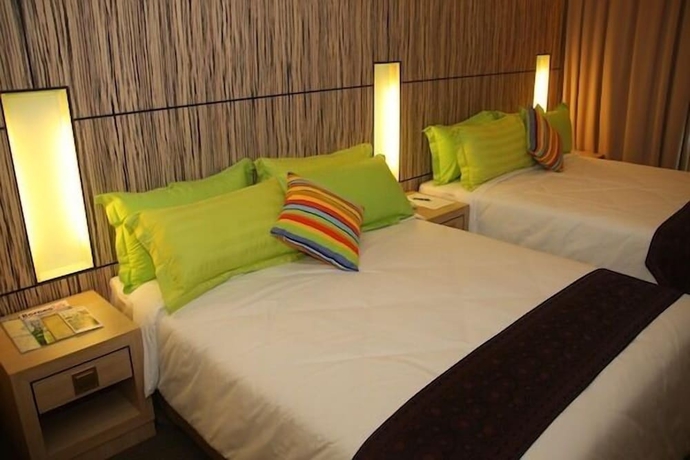 Imagen de la habitación del Hotel Grand Medallion. Foto 14