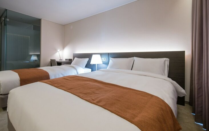 Imagen de la habitación del Hotel Grand Mer Jeju. Foto 14