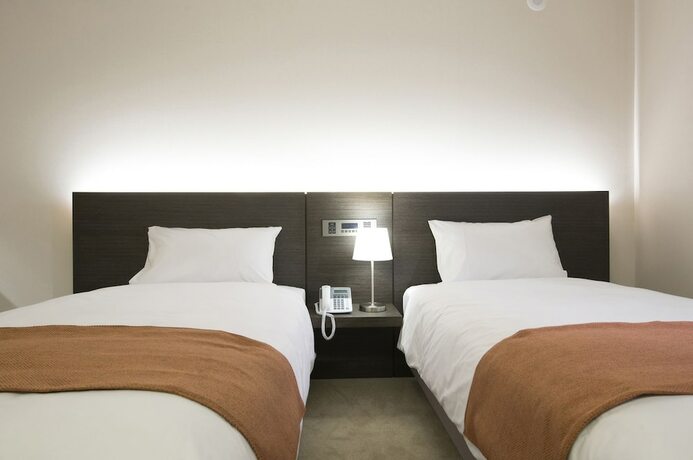 Imagen de la habitación del Hotel Grand Mer Jeju. Foto 19