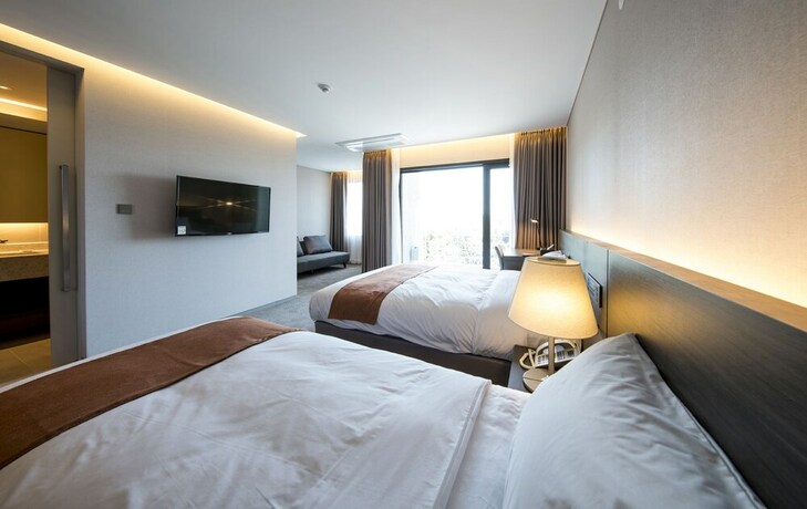 Imagen de la habitación del Hotel Grand Mer Jeju. Foto 22